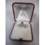 A 9ct white gold amethyst and diamond ring