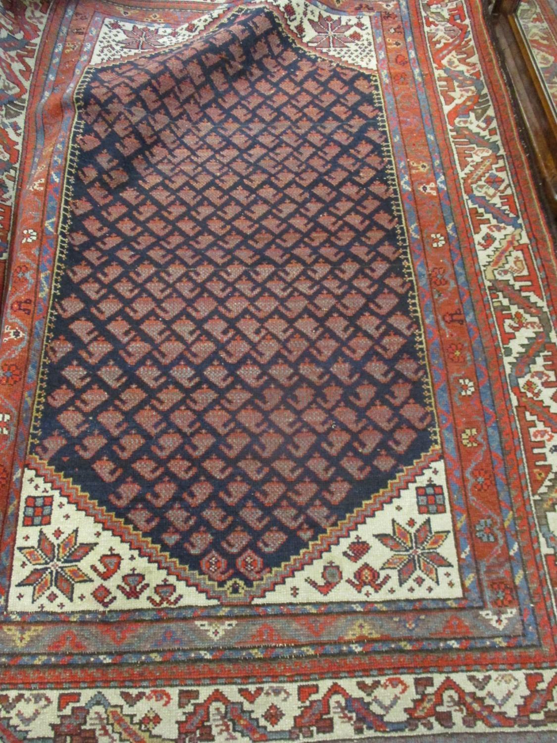 A Kelim rug having a terracotta ground with diamond and geometric design, 167cm x 185cm together - Image 2 of 3