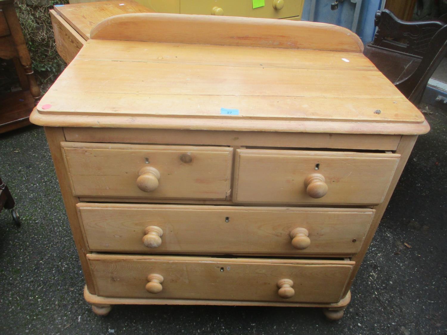 A Victorian pine chest of two short and three long drawers raised on turned feet 90cm h x 88cm w