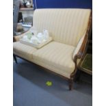 A Wesley-Barrell upholstered two seater sofa in a cream striped fabric