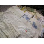 A quantity of 20th century linen and lace to include tablecloths