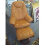 A vintage Anderssons Swedish leather swivel reclining Stressless chair and footstool