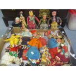 A selection of dolls to include Chinese and Japanese dolls