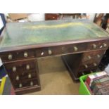 A mahogany twin pedestal desk with green leather scriber A/F