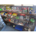 A selection of mainly boxed cars and motorbikes to include Diecast, Corgi, and others, together with