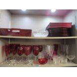 A miscellaneous lot to include red bowls, drinking glasses, ceramics and other table wares