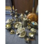 A quantity of solver plate to include a pair of candlesticks and teapots together with a copper