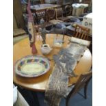 A mixed lot of ethnic and interior design artefacts to include a snake skin, tribal art figurine,