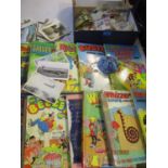 Loose stamps, franked envelopes, 1970/1980s children's annuals to include Beano, vintage postcards