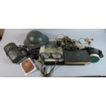 A Tray Containing Various Military Items to Include Helmet, Goggles, Water Bottle, Binoculars,