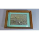 A Framed Pressed Metal Mid 20th Century European Plaque Depicting Nude Maiden on Beach with