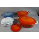 A Collection of Various Enamelled Lidded Cooking Pots and an Enamelled Roasting Tin