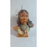 A Ceramic Bust of a Native American, 30cm high