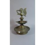 A Heavy Bronze Indian Temple Oil Lamp with Bird Finial, 25cm high