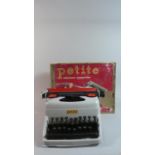 A Vintage Toy Typewriter by Petite, with Original Box