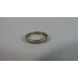 A Vintage White Metal and White Stone Full Eternity Ring