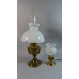 A Vintage Aladdin Oil Lamp and an Electric Table Lamp