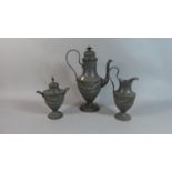 A Reproduction French Pewter Adam Style Three Piece Coffee Service, Coffee Pot 31cm High