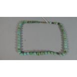 A Graduate Green Stone Bead Necklace