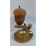 A Carved Wooden Black Forest Style Smokers Companion with Tobacco Pot in the Form of an Enlarged