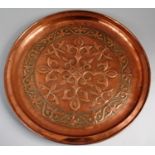 A Keswick School of Arts Circular Copper Charger Decorated with Fleur De Lys Design, Stamped with