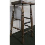 A 20th Century Kitchen Bar Stool with Carved Shaped Seat and Turned Supports, 75cm high