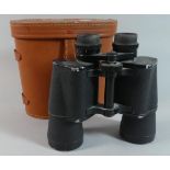 A Pair of Leather Cased Binoculars