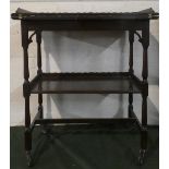 An Edwardian Mahogany Two Tier Galleried Tea Trolley/Games Table with Lift and Twist Top Having