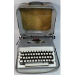 A Vintage Remington Monarch Manual Portable Typewriter in Carrying Case