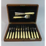A Mahogany Cased Set of Six Fish Knives and Forks with Servers
