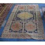 A Vintage Patterned Woollen Rug, 196cm x 130cm