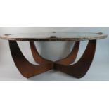 An Arts and Crafts Oval Copper Mirror Frame Converted to Glass Topped Coffee Table, 84cm Wide