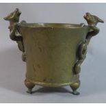 A Chinese Bronze Tripod Censer Of Tapering Cylindrical Form having Pair of Climbing Dragons as