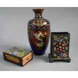 A Small Oriental Cloisonne Vase, a Small Cloisonne Match Box Holder and a Similar Desk Top Match Box