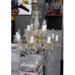 A Glass and Acrylic Ceiling Chandelier with Twelve Lamps, 75cm High