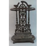A Pierced Cast Iron Stick Stand with Removable Tray, 51cm high