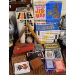 A Tray Containing Playing Cards, Marbles, Jigsaws, Games etc