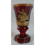 A Good Bohemian Gilt Overlaid Ruby Glass Goblet decorated with Mounted Turkish Soldier Riding Away