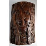 A Carved Far Eastern Wall Hanging Depicting Mask in Tree, 30cm High