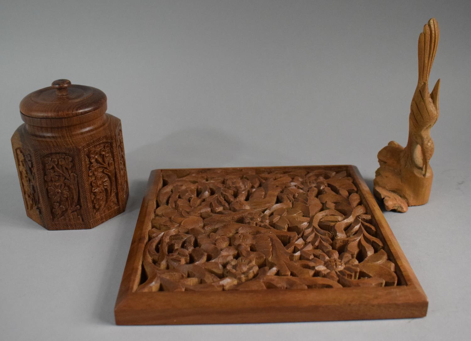 A Carved Oriental Octagonal Tea Caddy, Pierced Wall Hanging Decorated with Birds and a Root