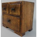 A Miniature Boxwood Apprentice Piece in the form of a Chest of Two Short and One long Drawers,