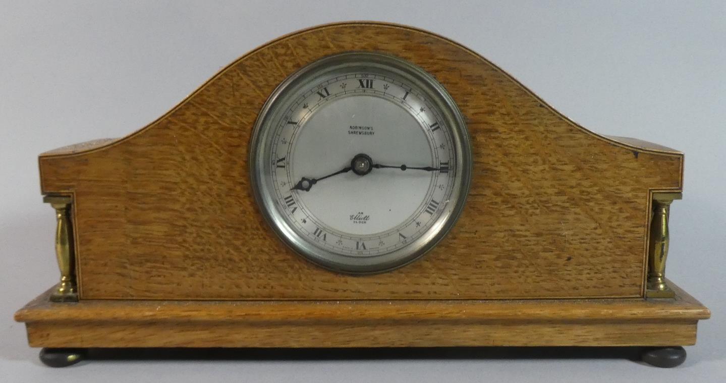 A Mid 20th Century Brass Mounted Mantle Clock by Elliot, the Dial Inscribed by for Robinson of