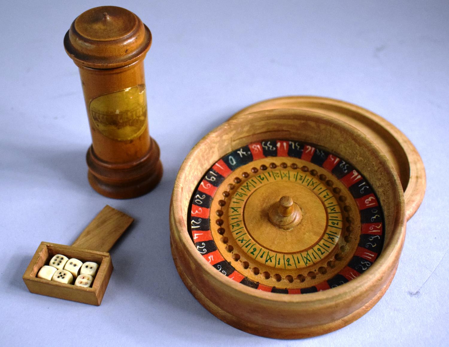 A Cylindrical Mauchline Ware Needle Case for Clare College Cambridge, a Treen Roulette Wheel with - Image 2 of 2