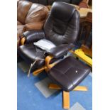 A Debenhams Leather Reclining Armchair with Matching Stool
