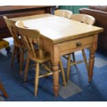 A Rectangular Pine Kitchen Table with Single End Drawer, Together with Four Dining Chairs, Table