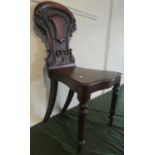 A Victorian Shield Back Hall Chair with Carved Decoration