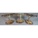 A Set of Three White Painted Cast Iron Stands, Each 32cm Wide