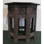 An Oriental Carved Octagonal Table, 50cm Diameter