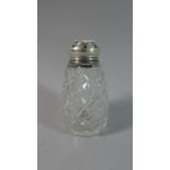 A Silver Topped Glass Sugar Sifter