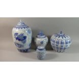 A Collection of Four Various Blue and White Oriental Lidded Vases, The Tallest 37cm